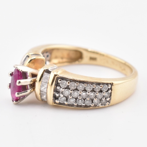 182 - A 14ct gold ruby and diamond ring. The ring set with a central marquise cut ruby flanked by two colu... 