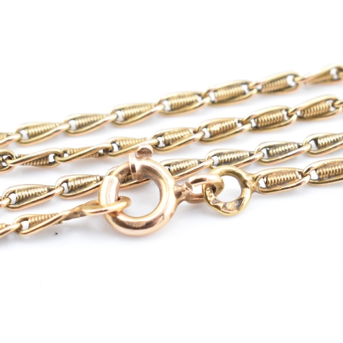 188 - A 9ct gold fancy link chain necklace. The fancy link yellow gold chain necklace having a spring ring... 