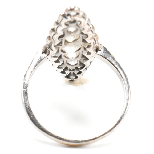 200a - A diamond cluster ring. The ring having a marquise shaped head set with 35 diamonds largely old cut ... 