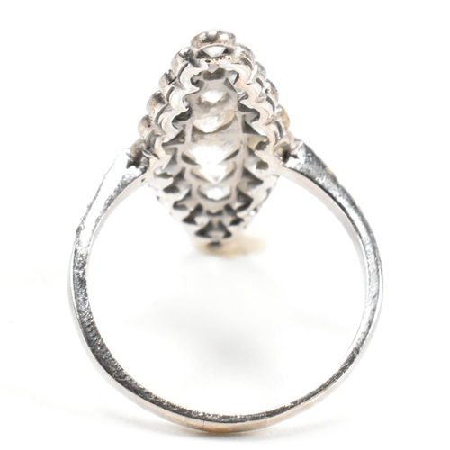 200a - A diamond cluster ring. The ring having a marquise shaped head set with 35 diamonds largely old cut ... 