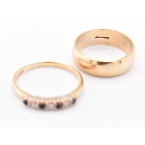 201 - A hallmarked 9ct gold band ring and a hallmarked 9ct gold, sapphire and diamond half hoop ring. The ... 