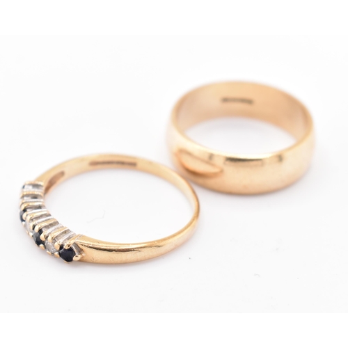 201 - A hallmarked 9ct gold band ring and a hallmarked 9ct gold, sapphire and diamond half hoop ring. The ... 