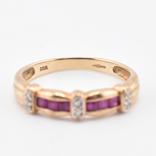 212 - A hallmarked 9ct gold ruby and diamond ring. The 9ct yellow gold ring set with six channel set squar... 