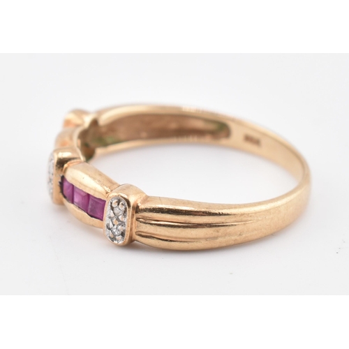 212 - A hallmarked 9ct gold ruby and diamond ring. The 9ct yellow gold ring set with six channel set squar... 