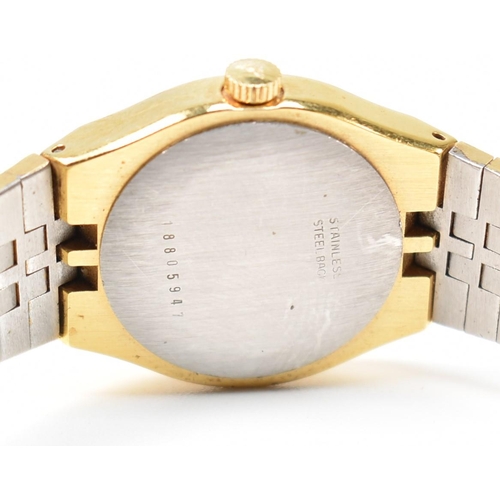 215 - A Longines ladies' gilt on stainless steel wristwatch. The signed Longines watch having stick indice... 