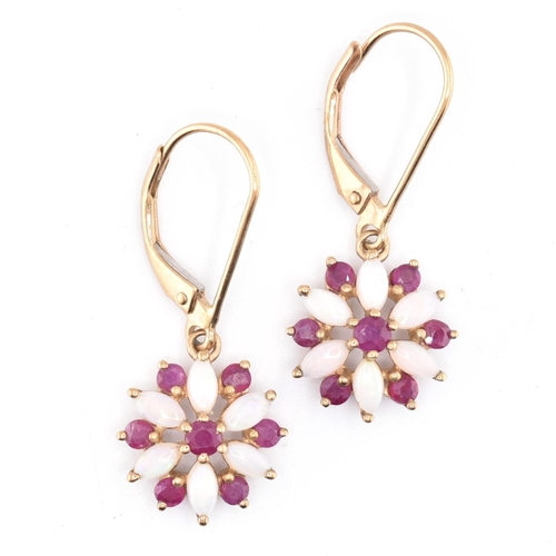 216 - A pair of ruby and opal floral cluster pendant earrings with French lever clasps. The earrings stamp... 