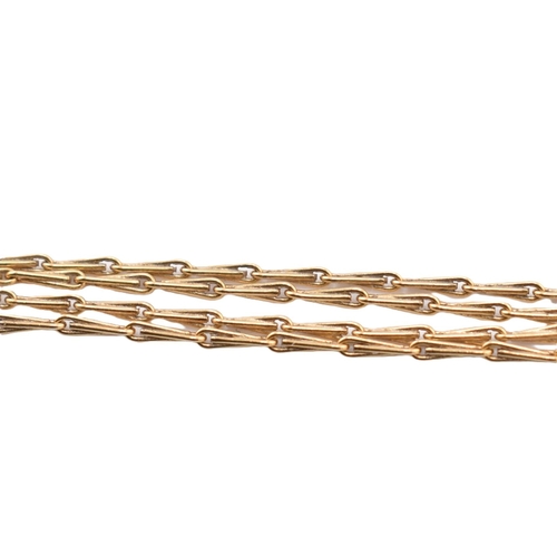 219 - An 18ct gold chain necklace. The fancy link yellow gold chain necklace having a spring ring clasp fa... 