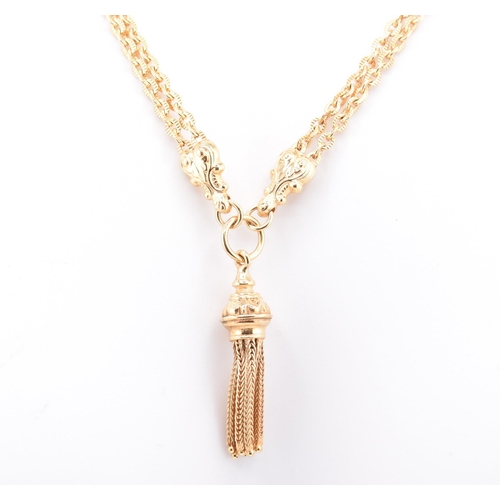 22 - A hallmarked 9ct gold tassel chain necklace. The 9ct yellow gold necklace having a tassel pendant su... 