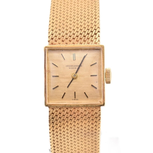 22A - A hallmarked 18ct gold International Watch Company wristwatch. The wristwatch having a square dial w... 