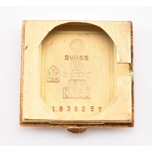 22A - A hallmarked 18ct gold International Watch Company wristwatch. The wristwatch having a square dial w... 