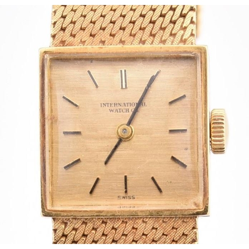 22A - A hallmarked 18ct gold International Watch Company wristwatch. The wristwatch having a square dial w... 