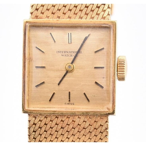 22A - A hallmarked 18ct gold International Watch Company wristwatch. The wristwatch having a square dial w... 