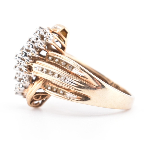 235 - A hallmarked 9ct gold and diamond cluster ring. The 9ct gold ring set with 61 round brilliant cut di... 