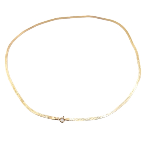 236 - A hallmarked 9ct gold snake chain necklace. The 9ct yellow gold necklace hallmarked with import mark... 