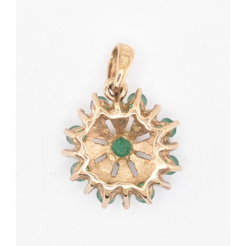 242 - A 9ct gold opal and emerald floral cluster pendant. Weight 1.21g. Marked 9K. All weights, measuremen... 