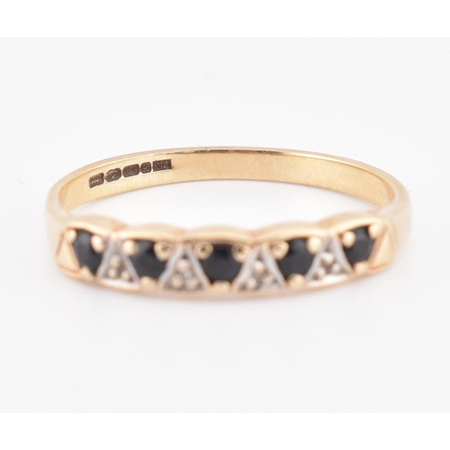 244 - A hallmarked 9ct gold sapphire and diamond half hoop ring. The 9ct yellow gold ring set with five ro... 