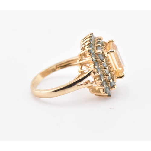 250 - A hallmarked 9ct gold, citrine and alexandrite cluster ring. The 9ct yellow gold ring set with a cen... 