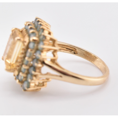 250 - A hallmarked 9ct gold, citrine and alexandrite cluster ring. The 9ct yellow gold ring set with a cen... 