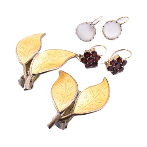 250A - A pair of David Anderson earrings and two pairs of yellow metal and gem set earrings. The lot to inc... 