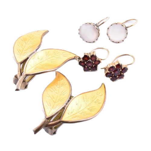 250A - A pair of David Anderson earrings and two pairs of yellow metal and gem set earrings. The lot to inc... 