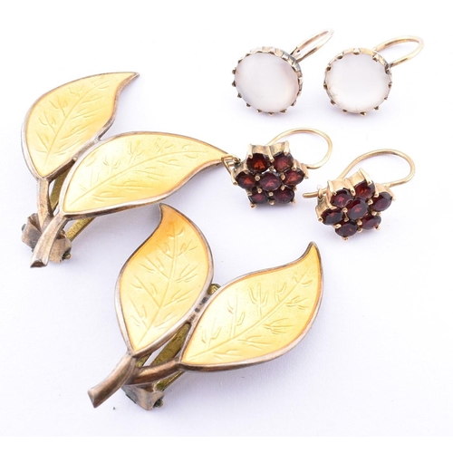 250A - A pair of David Anderson earrings and two pairs of yellow metal and gem set earrings. The lot to inc... 