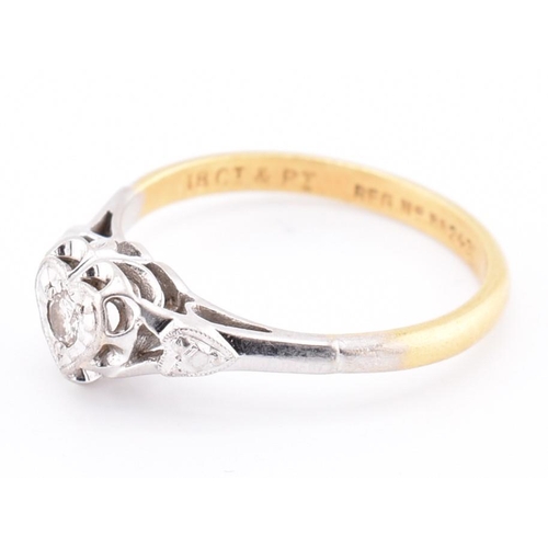 251 - A 1950s 18ct gold and platinum diamond solitaire heart ring. The 1950s 18ct yellow gold and platinum... 