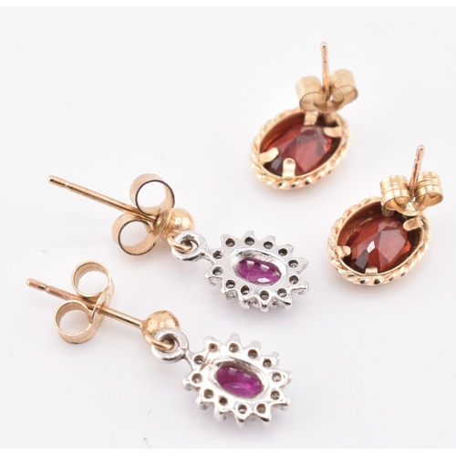 253 - Two pairs of gold and gem set earrings. The lot to include a pair of 9ct gold and red stone stud ear... 