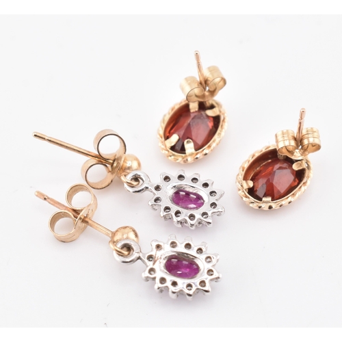 253 - Two pairs of gold and gem set earrings. The lot to include a pair of 9ct gold and red stone stud ear... 