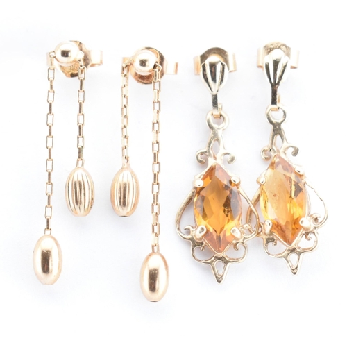 264 - A pair of 9ct gold and citrine pendant earrings together with a pair of Italian hallmarked 9ct gold ... 