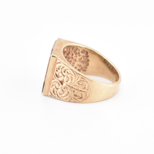 265 - A hallmarked 9ct gold and diamond signet ring. The 9ct yellow gold ring having 16 round brilliant cu... 