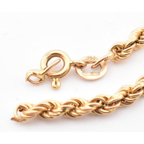 266 - A hallmarked 18ct gold twisted rope chain bracelet AF. The 18ct yellow gold rope twist chain bracele... 