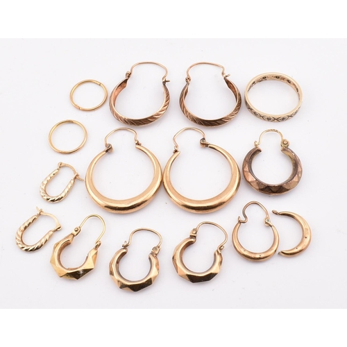 267 - A collection of 9ct gold earrings AF and band ring. The earrings to include three pairs of 9ct gold ... 