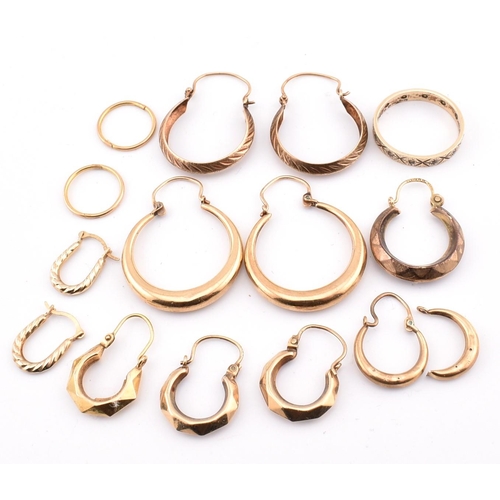 267 - A collection of 9ct gold earrings AF and band ring. The earrings to include three pairs of 9ct gold ... 