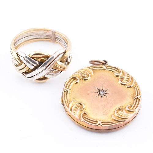 268 - A Victorian 9ct gold and diamond locket pendant with a gold and silver puzzle ring. The lot to inclu... 