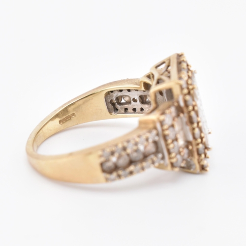 270 - A hallmarked 9ct gold, white and champagne diamond ring. The 9ct yellow gold ring set with 15 square... 