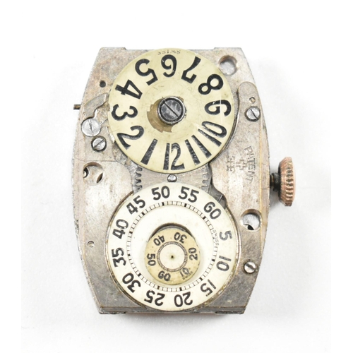 3 - A 1930s hallmarked 9ct gold jump hour wristwatch. The wristwatch having a hallmarked 9ct gold case w... 