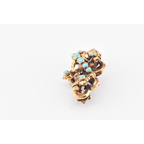 39 - A 19th century gold and turquoise mourning brooch pin. The yellow gold brooch pin of scrolling form ... 