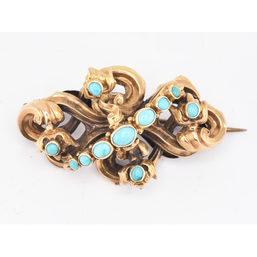 39 - A 19th century gold and turquoise mourning brooch pin. The yellow gold brooch pin of scrolling form ... 