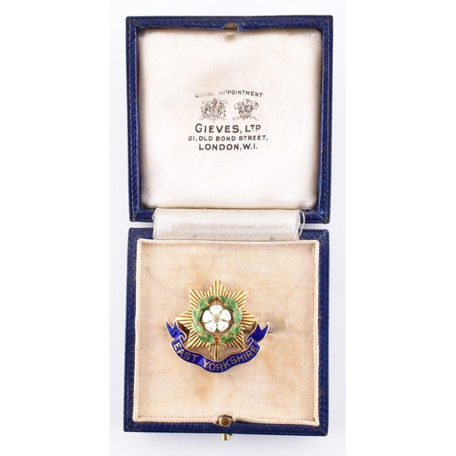 41A - 15ct gold East Yorkshire regimental brooch pin boxed. The 15ct yellow gold and enamel brooch pin in ... 