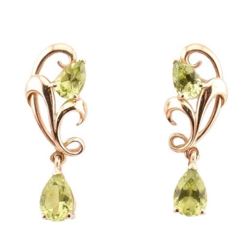 44 - Two pairs of hallmarked 9ct gold and peridot pendant earrings. The earrings to include a pair of hal... 