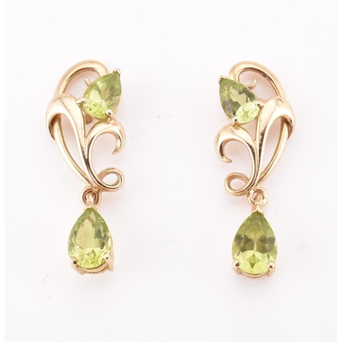 44 - Two pairs of hallmarked 9ct gold and peridot pendant earrings. The earrings to include a pair of hal... 