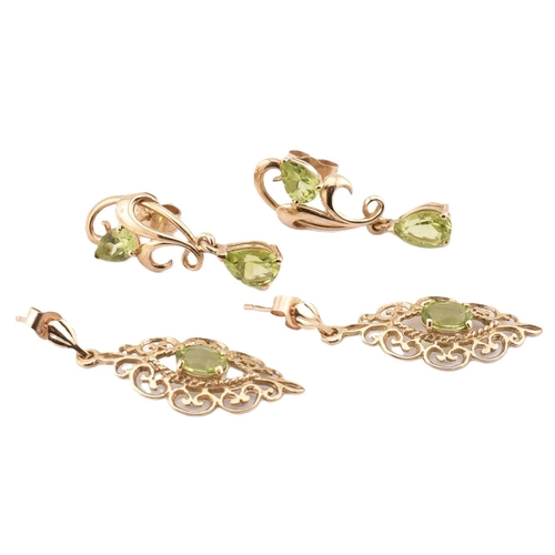 44 - Two pairs of hallmarked 9ct gold and peridot pendant earrings. The earrings to include a pair of hal... 