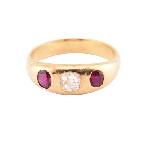 46 - An 18ct gold ruby and diamond gypsy ring. The 18ct yellow gold gypsy ring set with a central rubover... 