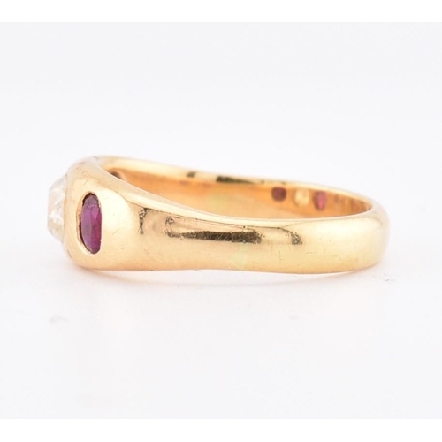 46 - An 18ct gold ruby and diamond gypsy ring. The 18ct yellow gold gypsy ring set with a central rubover... 