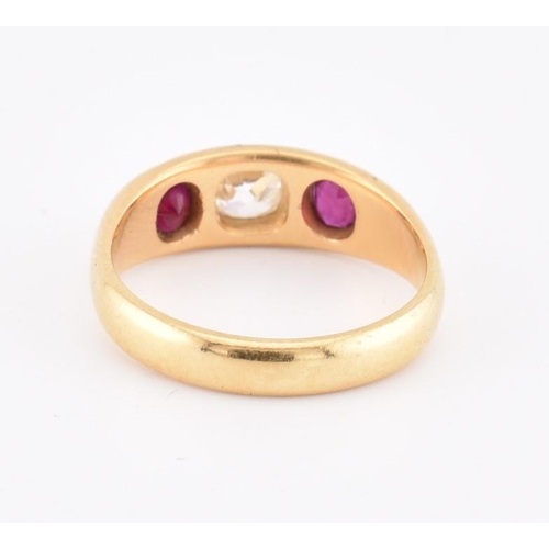 46 - An 18ct gold ruby and diamond gypsy ring. The 18ct yellow gold gypsy ring set with a central rubover... 