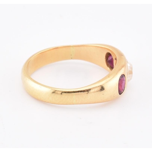 46 - An 18ct gold ruby and diamond gypsy ring. The 18ct yellow gold gypsy ring set with a central rubover... 