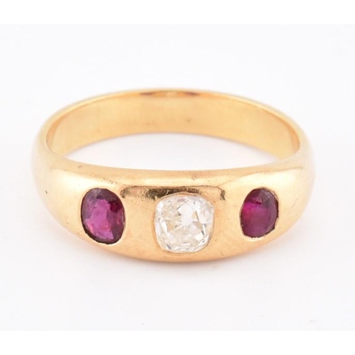 46 - An 18ct gold ruby and diamond gypsy ring. The 18ct yellow gold gypsy ring set with a central rubover... 