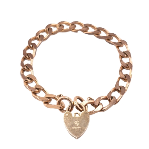 49 - A hallmarked 9ct gold curb link chain bracelet with a heart padlock clasp. The hallmarked 9ct gold c... 