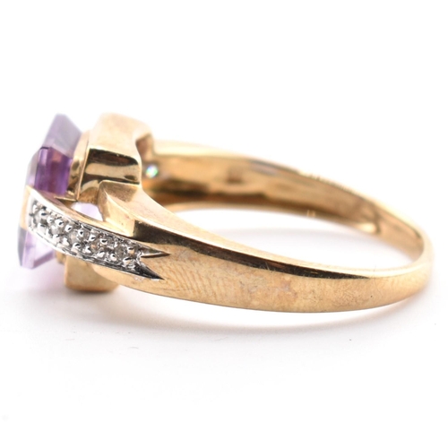 513 - A hallmarked 9ct gold amethyst and diamond ring. The ring set with a central step-cut amethyst to di... 