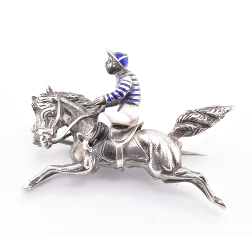 54 - A 19th century Victorian white metal novelty horse and Jockey brooch pin. The brooch in the form of ... 